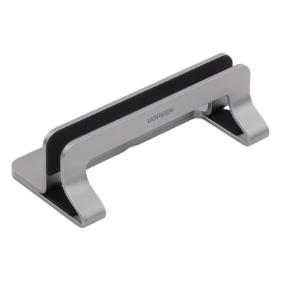 Soporte Vertical para Laptop / Adecuado para escritorio / Anchura Ajustable (12-26mm) / Amplia compatibilidad / Anti-Arañazos / Anti-Deslizante /Ajustable Mediante Tornillos / Color Plata / Aluminio + Silicona